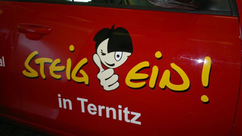 Werbeinsel Autobeschriftung